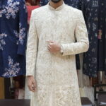 Ivory Heavily Embroidered Sherwani Set with Regal Heritage Motifs